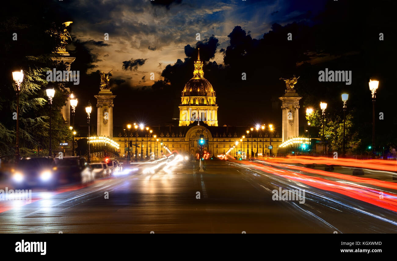 Les Invalides illuminated at night in Paris, France Stock Photo