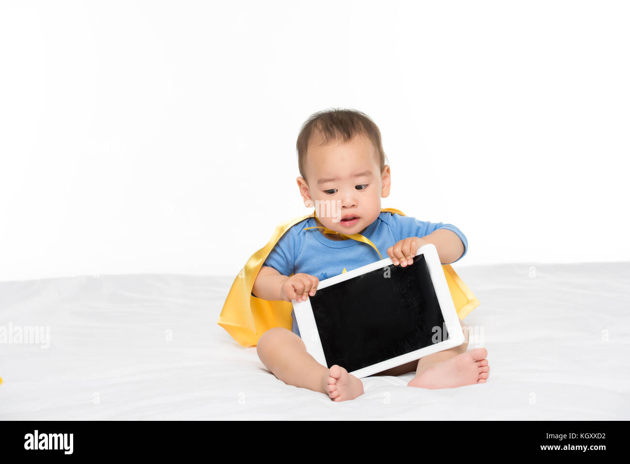 asian toddler boy with tablet Stock Photo