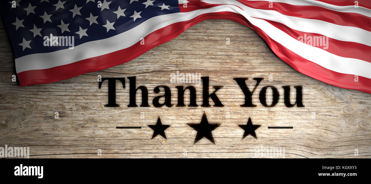 USA crumpled flag with thank you patriotic message placed on wooden