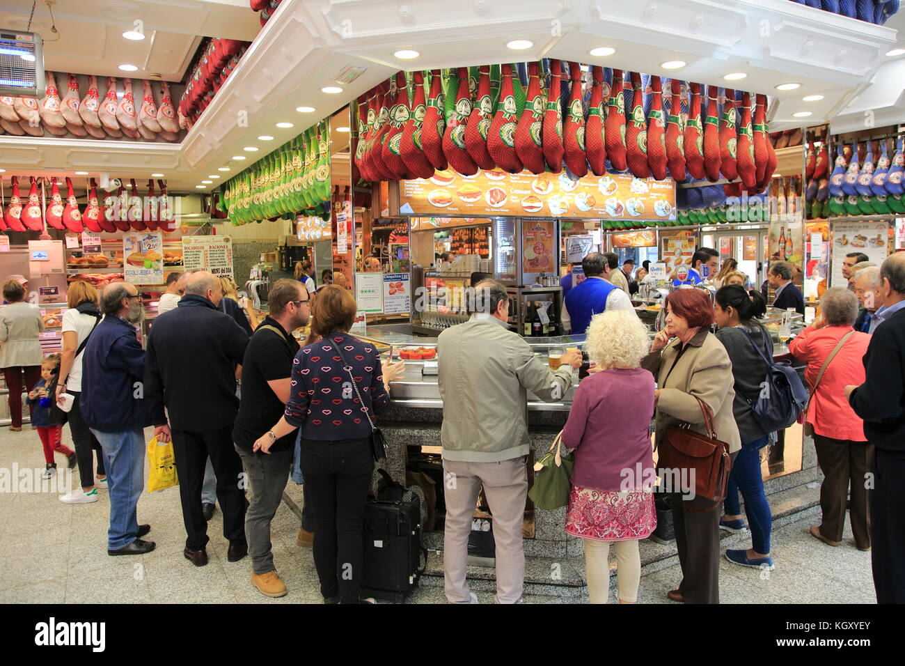 Customers inside a Museo del Jamon chain store shop in Madrid city