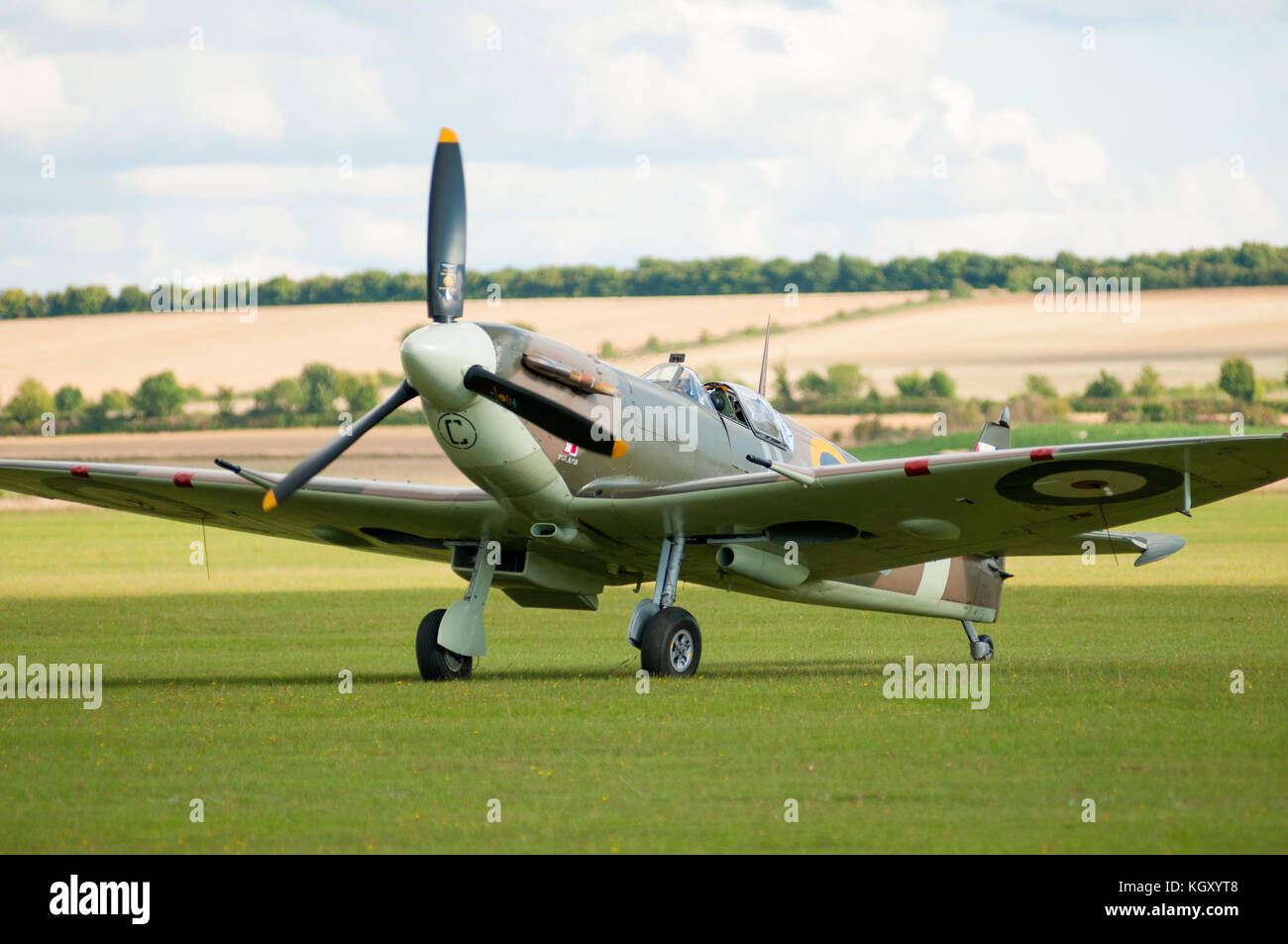 A Spitfire aircraft shown parked on an airfield in Cambridgeshire. Stock Photo
