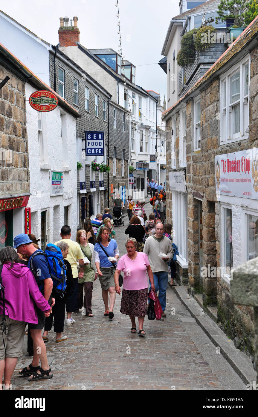 A busy  narrow back street in St Ives Cornwall.Suitable for pedestrians only it becomes very congested Stock Photo