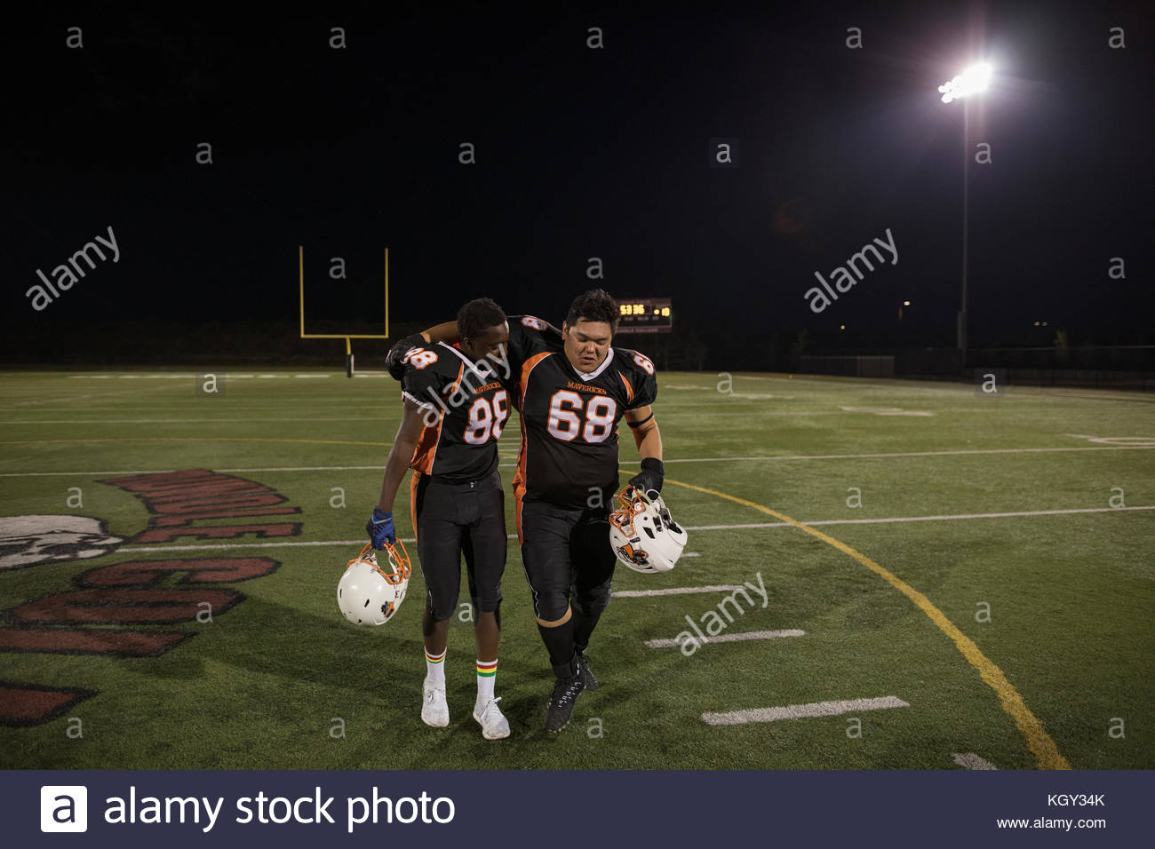 Two school boys hugging uniform hires stock photography and images Alamy