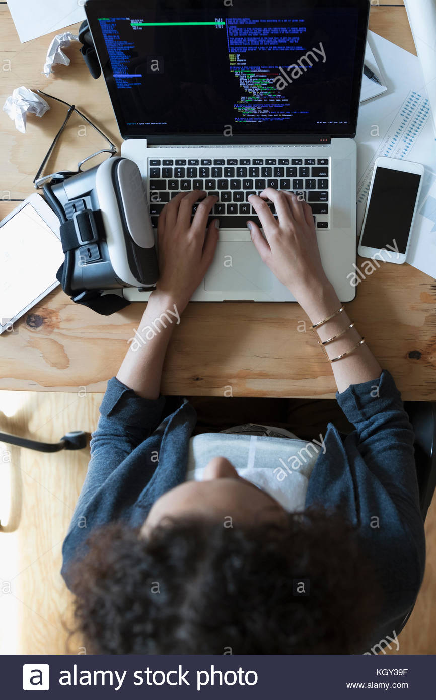 Overhead view female computer programmer designer programming virtual