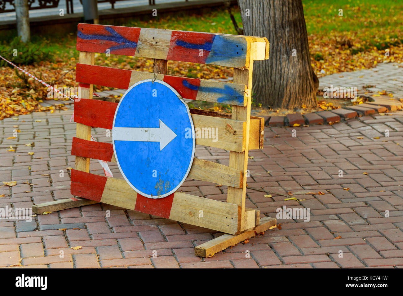 Sign of detour travel. Pit on the road. repair work sign circumvent bypass Stock Photo