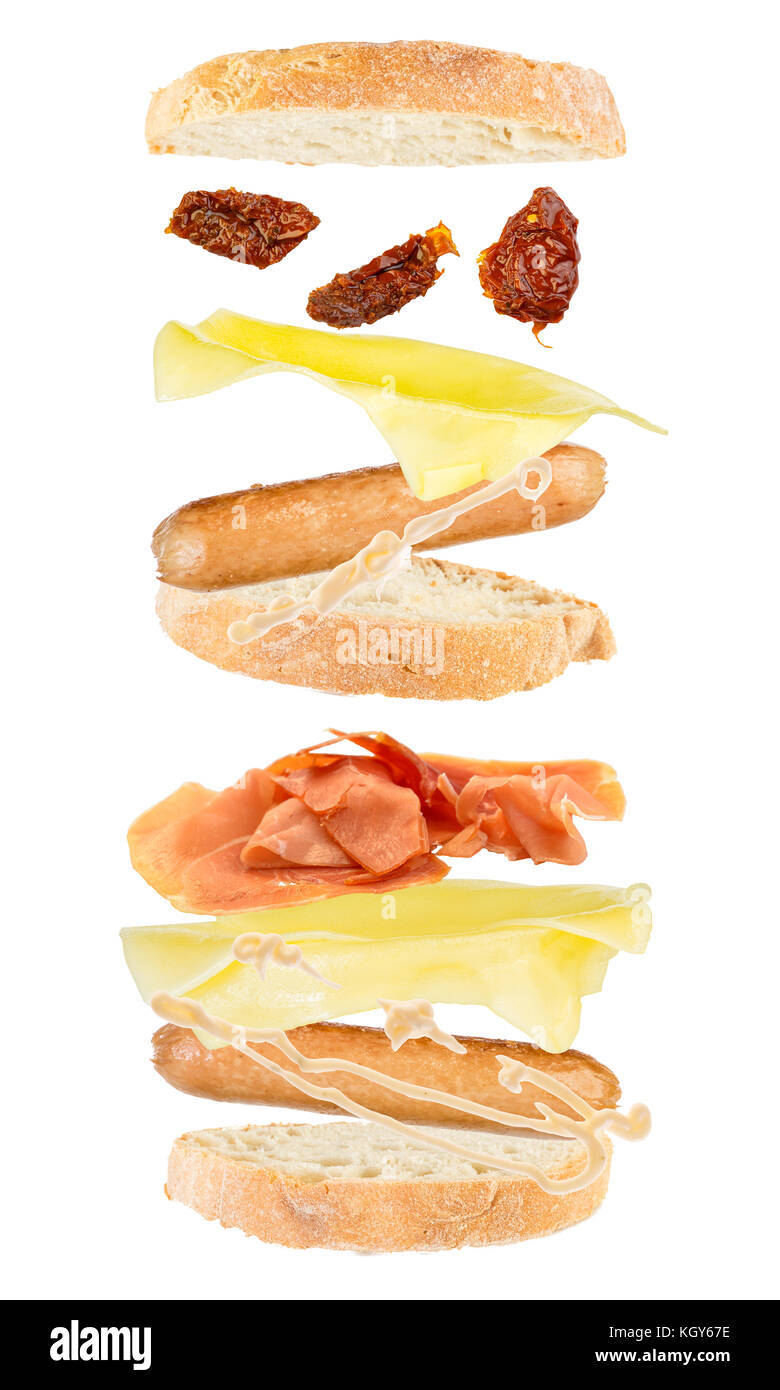 floating open sandwich with roast beef cheese, dry tomato and