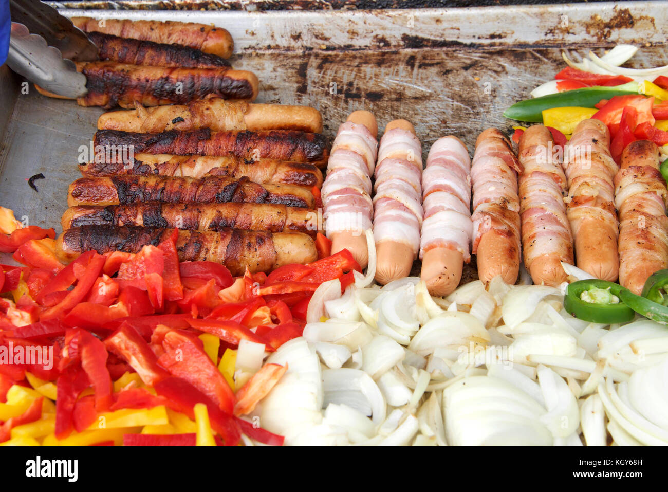 Bacon wrapped hot dogs, onions, jalapenos, and several varieties of