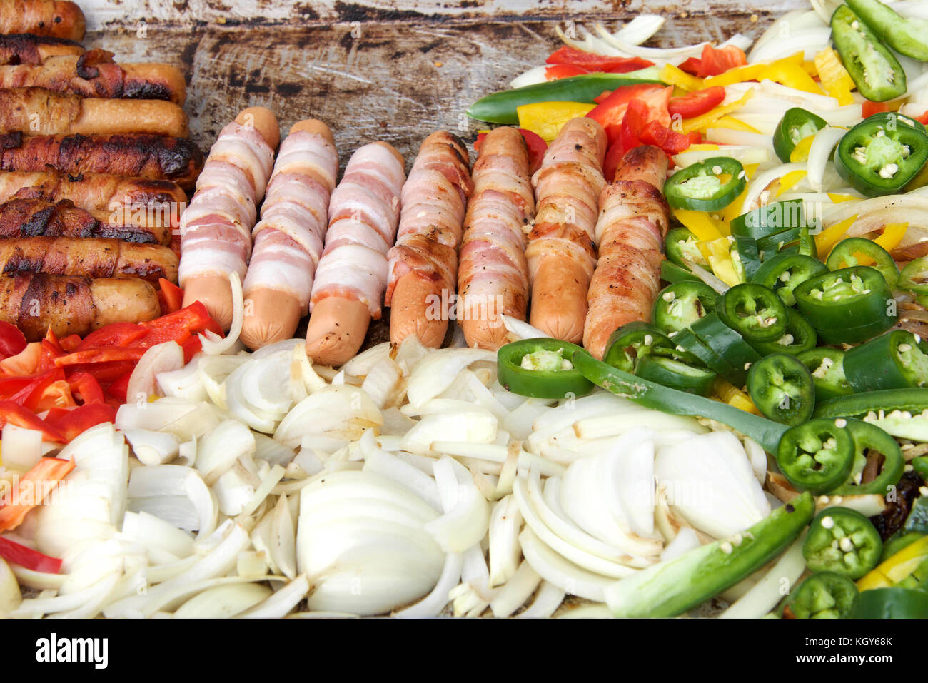 Bacon wrapped hot dogs, onions, jalapenos, and several varieties of
