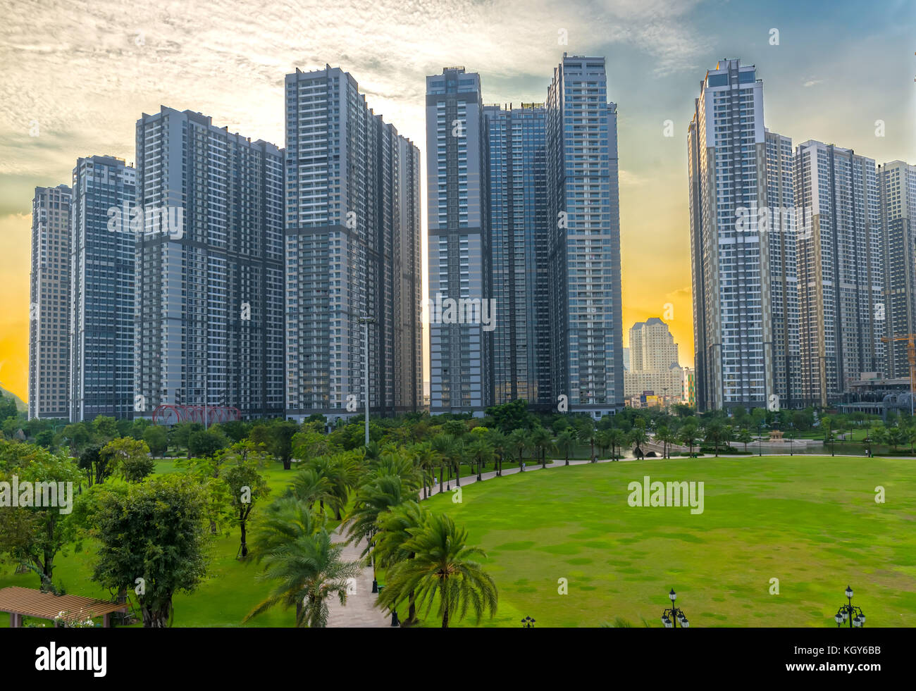 Panoramic skyscrapers at sunset with sky impressive in apartment, architectural extended life material development Stock Photo