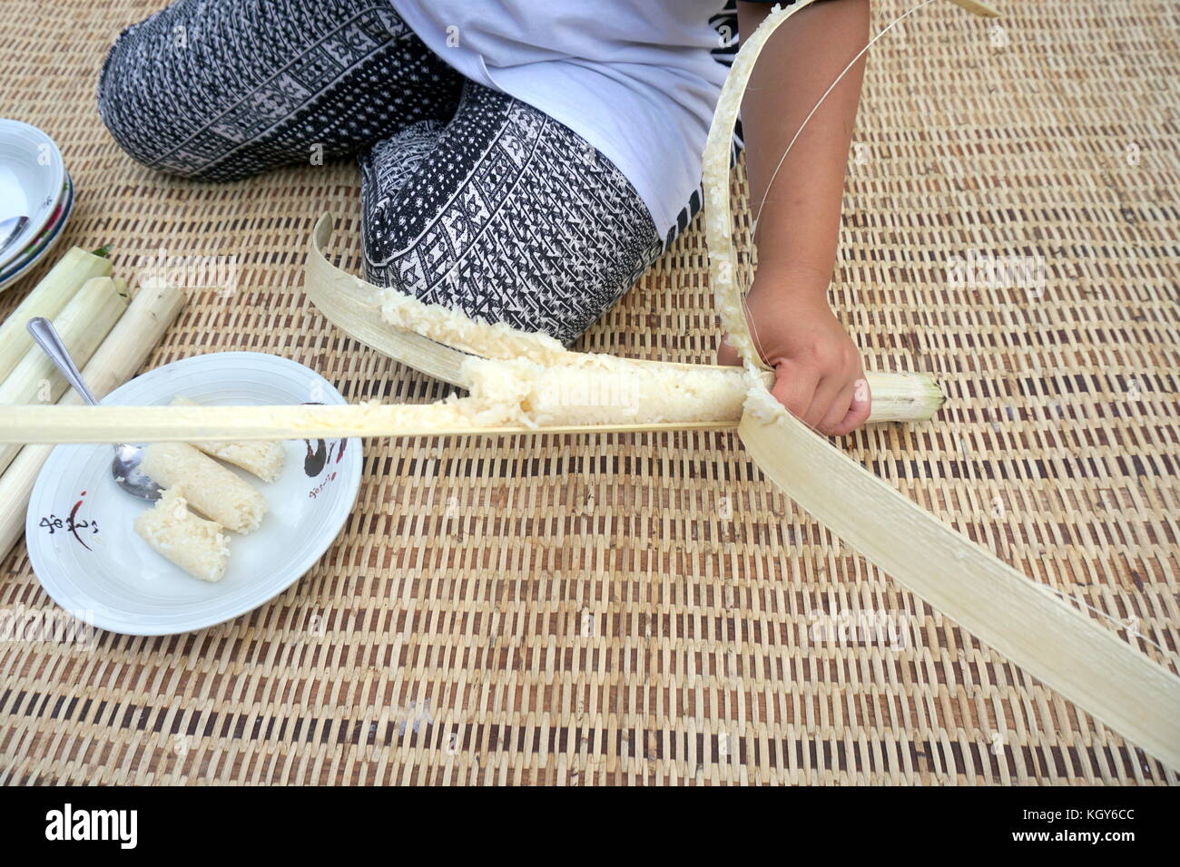 Rice cooked in bamboo hi-res stock photography and images - Alamy