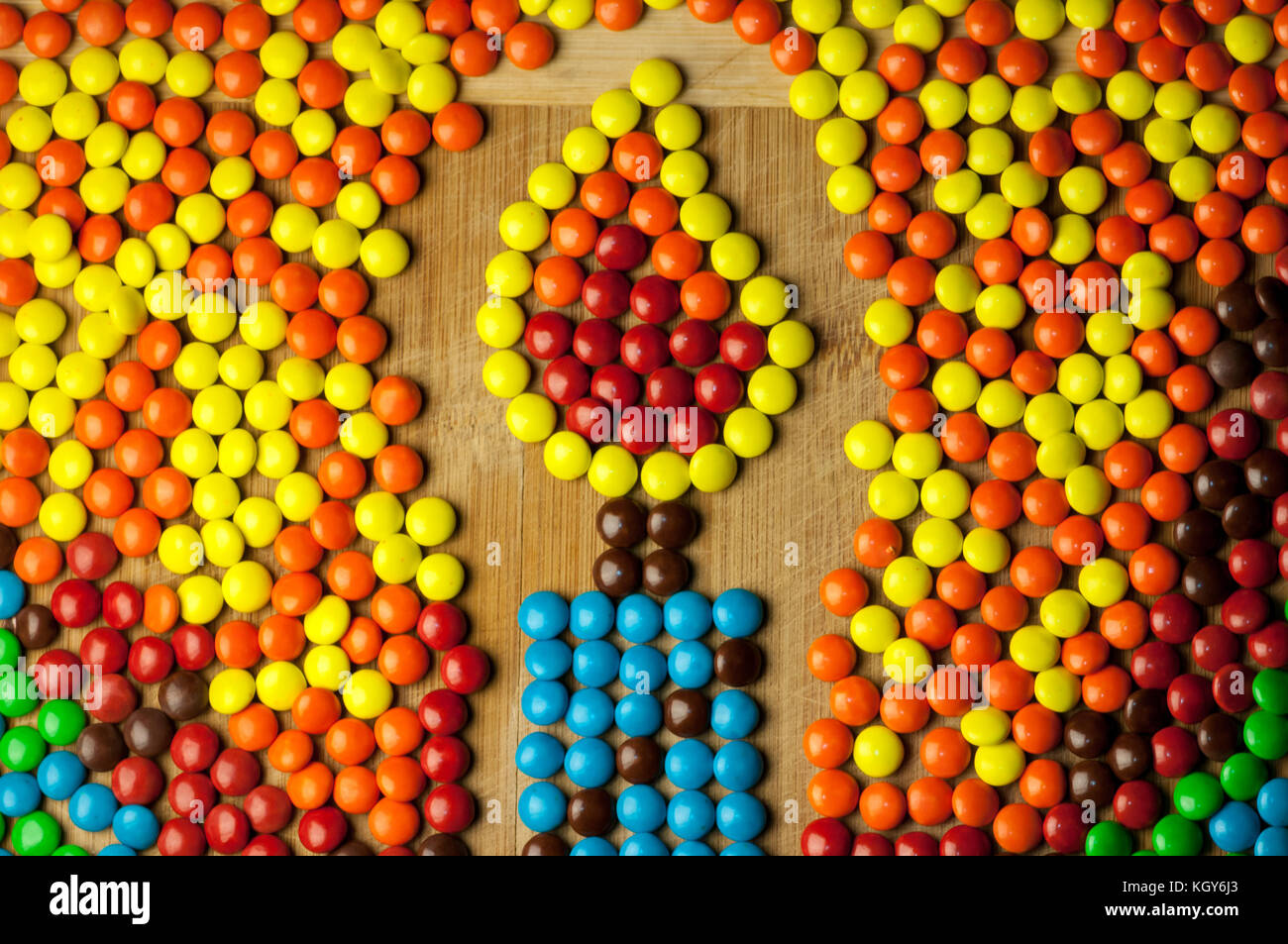 Hanukkah candle made of colorful round chocolate candy Stock Photo Alamy