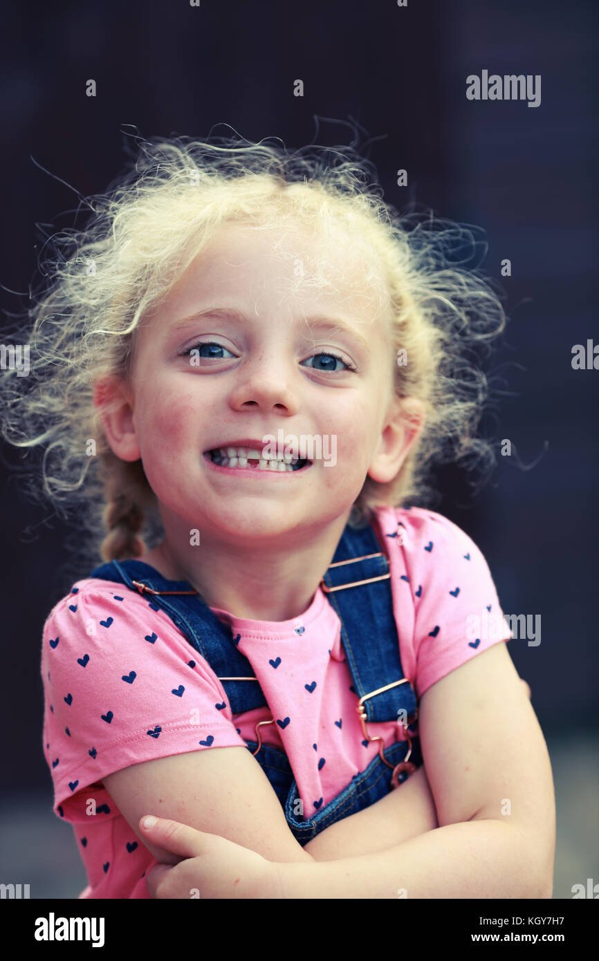 Little girl smiling with first missing tooth Stock Photo