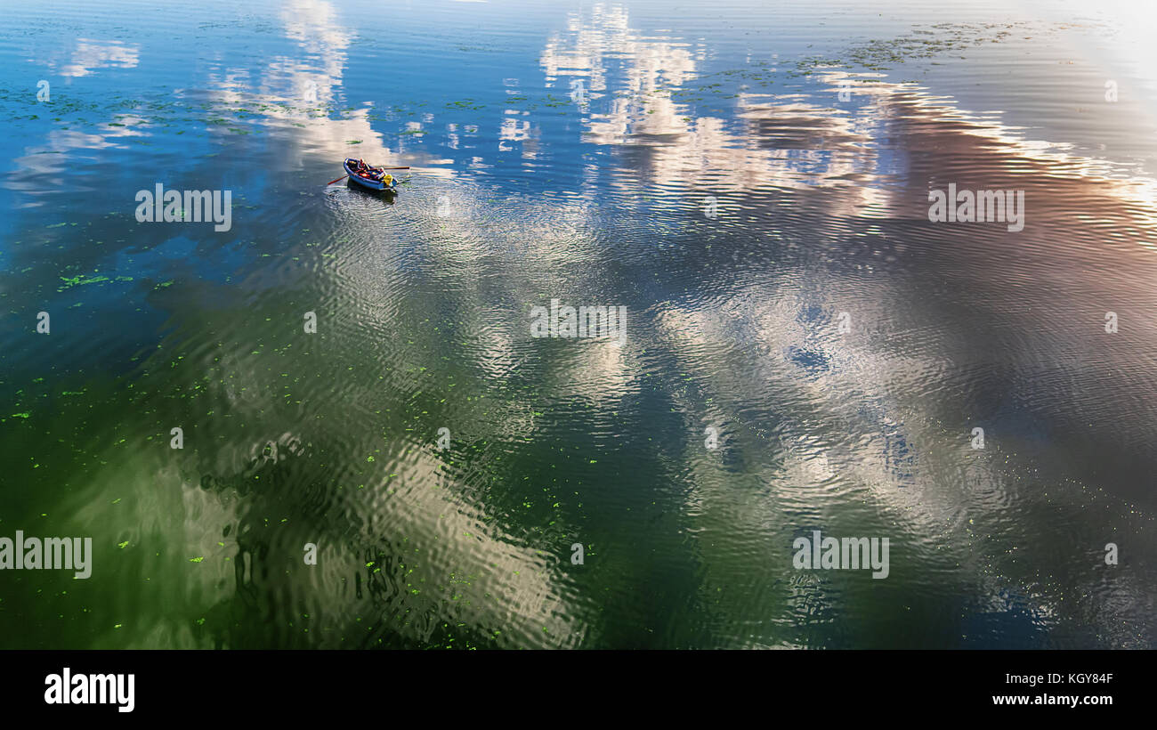 Aerial view of a wooden boat in the lake Stock Photo - Alamy