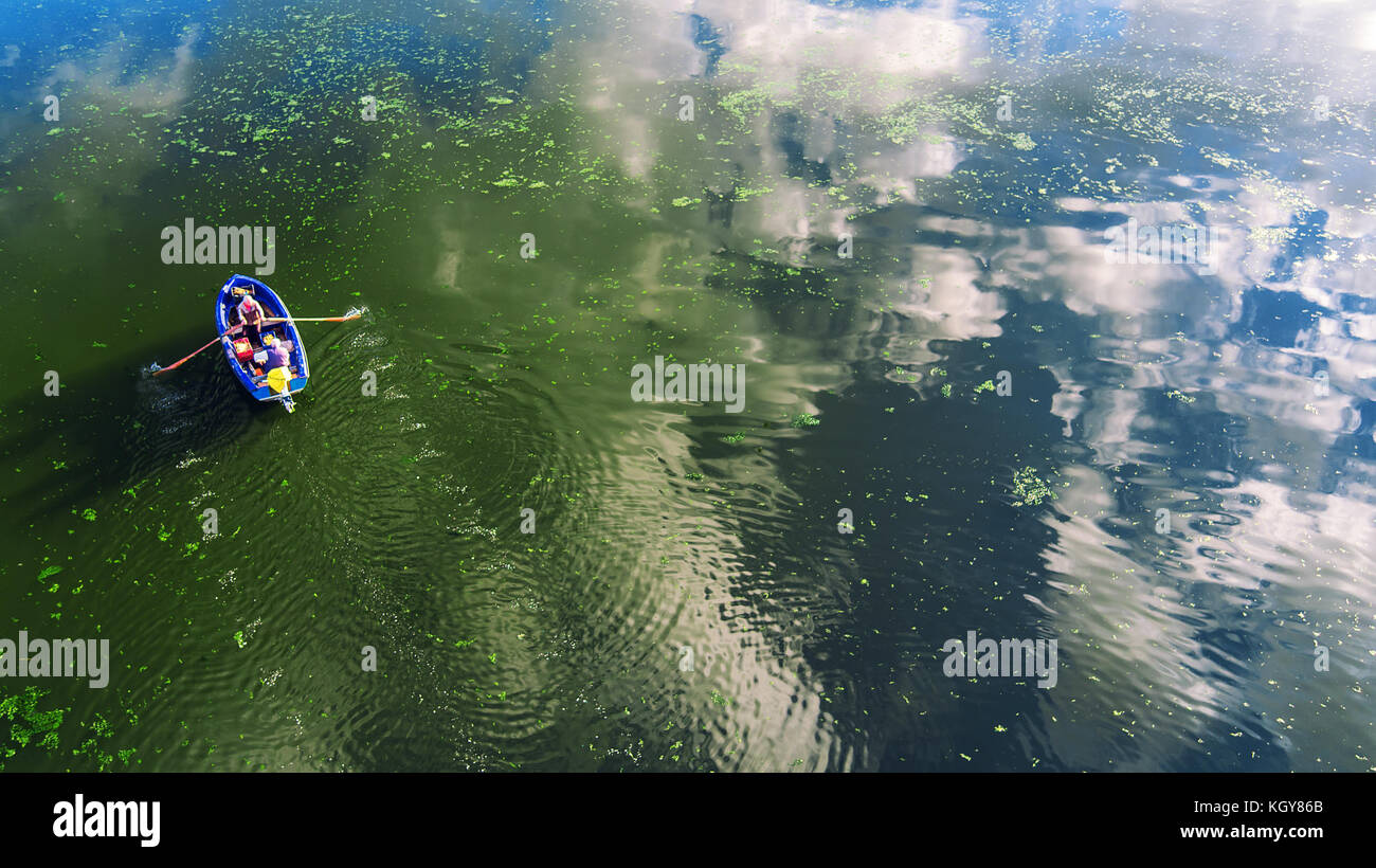 Aerial view of a wooden boat in the lake Stock Photo - Alamy