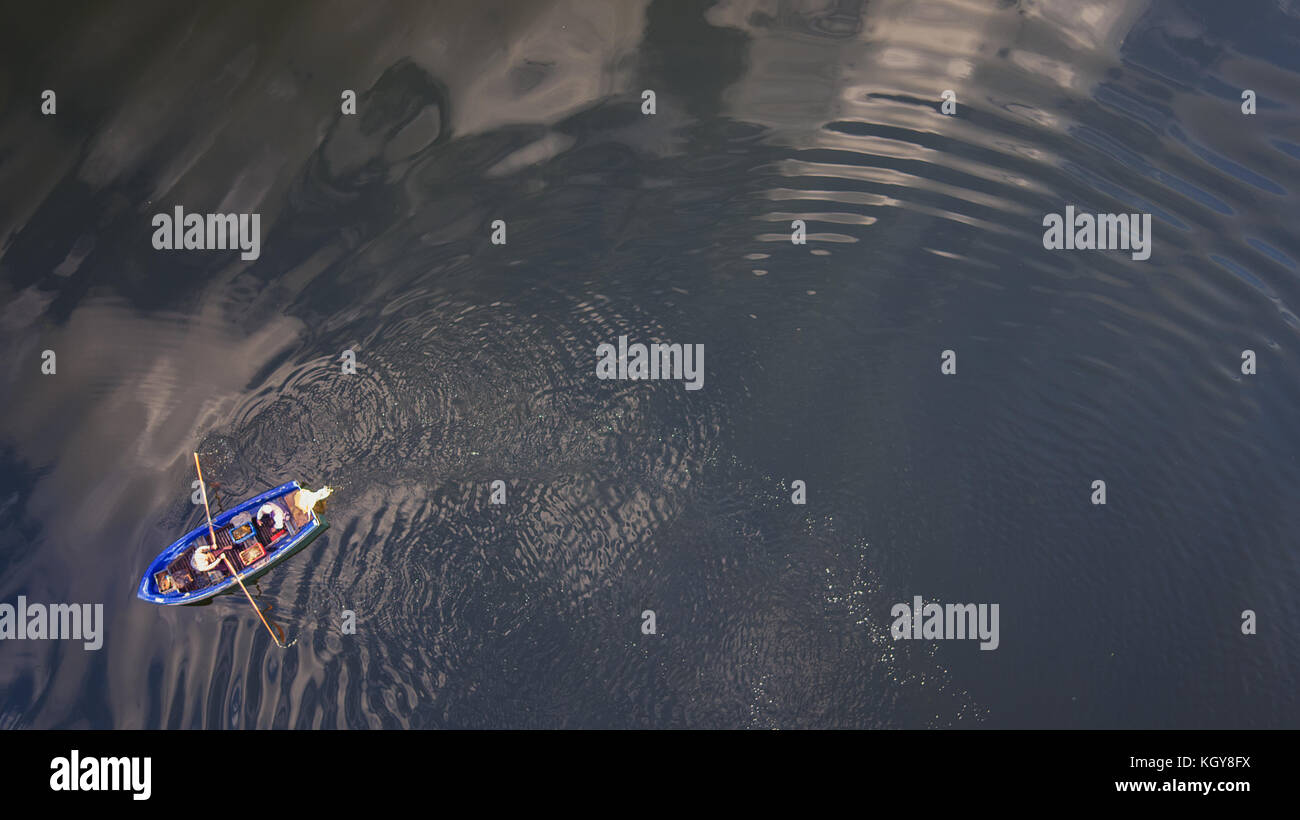 Aerial view of a wooden boat in the lake Stock Photo - Alamy