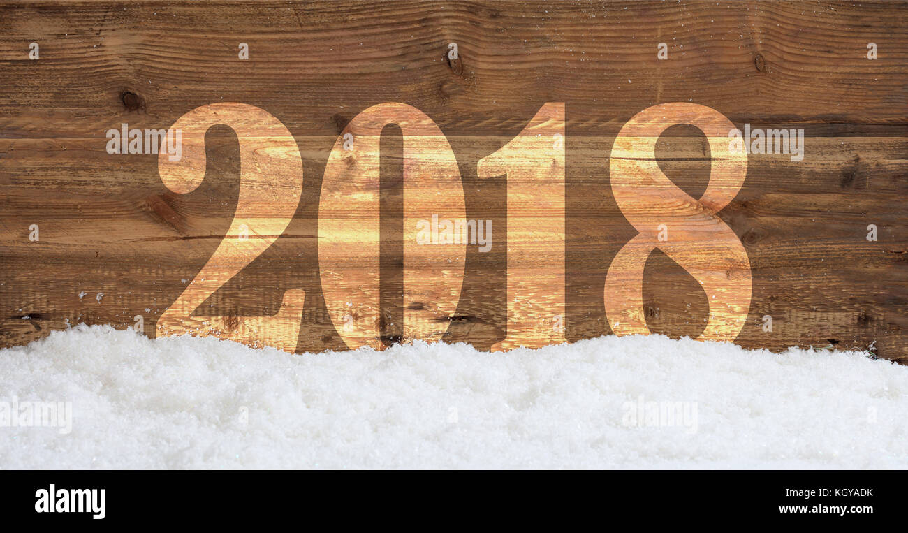 New year 2018 overlay on snowy wooden background Stock Photo