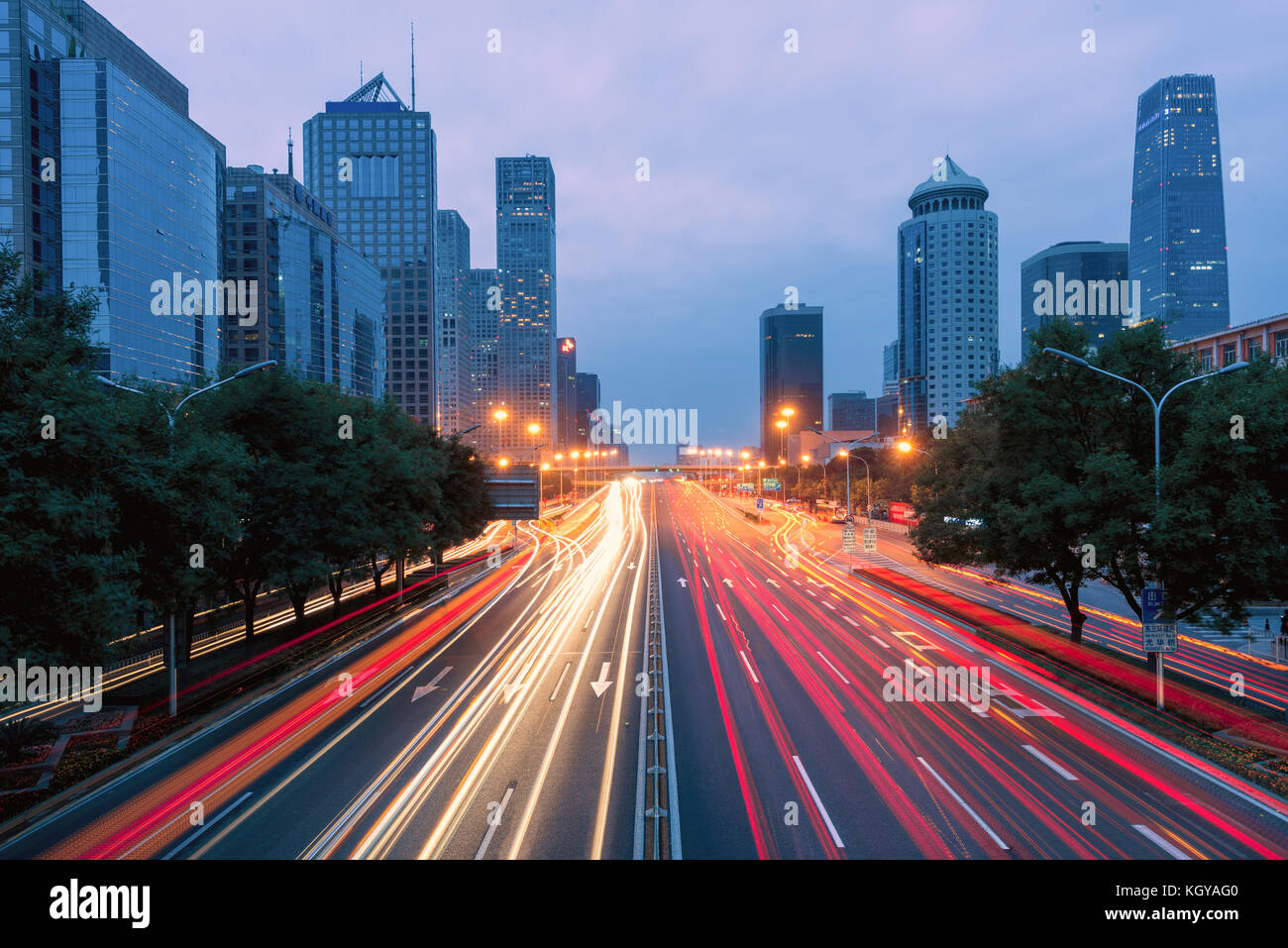 Light trails on the street at Beijing Central Business district at night in Beijing ,China. Stock Photo