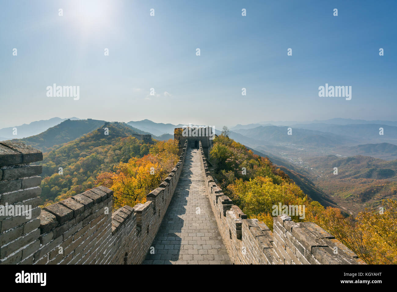 China The great wall distant view compressed towers and wall segments autumn season in mountains near Beijing ancient chinese fortification military l Stock Photo