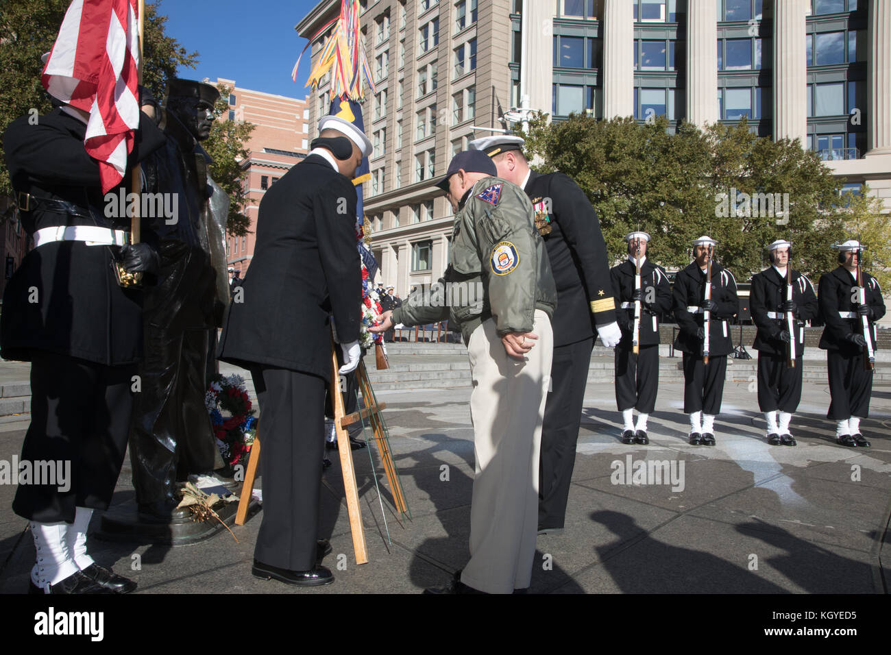 Rear Admiral Charles Rock, USN and Command Master Chief Charles Baldwin, USN (Ret.) lay a wreath