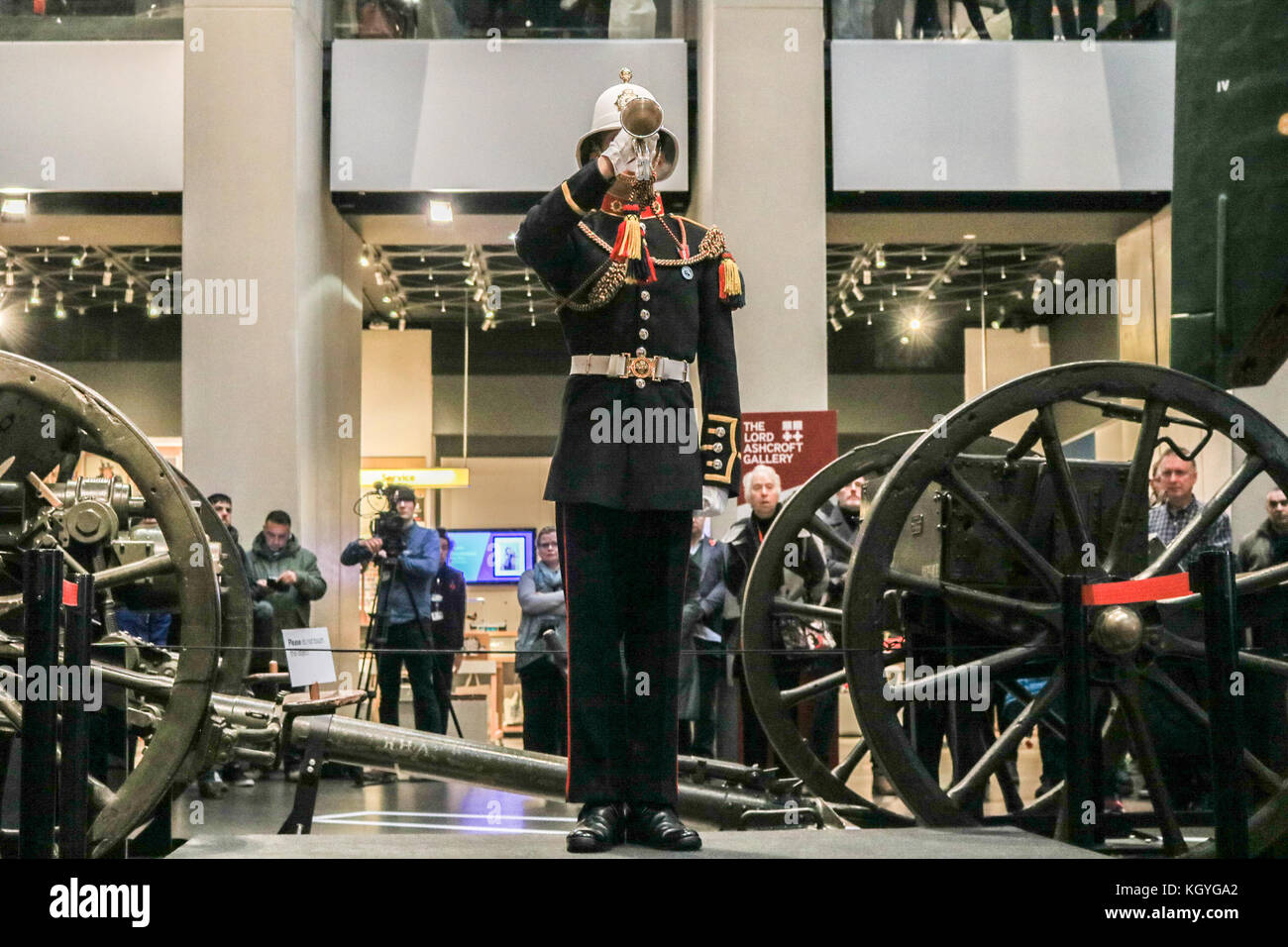 London, UK. 11th Nov, 2017. A Royal Marine Bugler plays the Last Post and Reveille at the Imperial War Museum London before the two minute silence observance as part of Armistice Day which is commemorated every year on 11 November to mark end of the First World War and the armistice signed between the Allies of World War I and Germany Credit: amer ghazzal/Alamy Live News Stock Photo