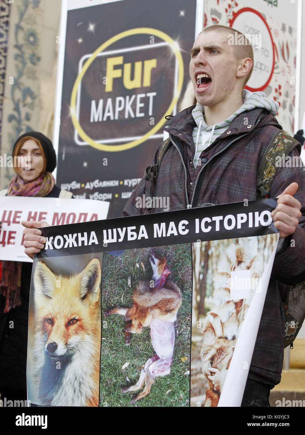 Kiev, Ukraine. 11th Nov, 2017. An activist holds a poster reading like ''Every fur coat has a