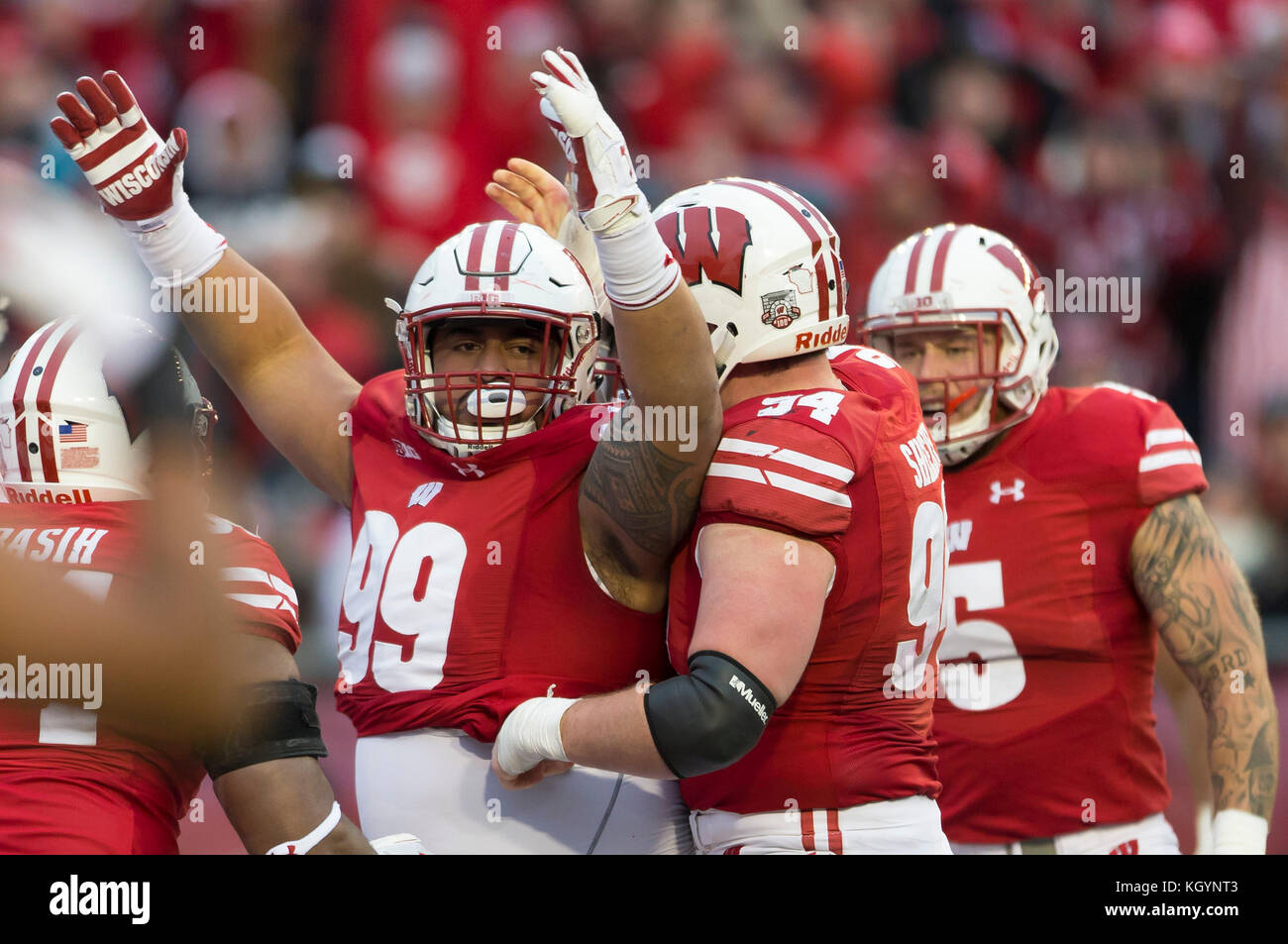 Madison, WI, USA. 11th Nov, 2017. Wisconsin Badgers nose tackle Olive Sagapolu #99 celebrates a sack during the NCAA Football game between the Iowa Hawkeyes and the Wisconsin Badgers at Camp Randall Stadium in Madison, WI. Wisconsin defeated Iowa 38-14. John Fisher/CSM/Alamy Live News Stock Photo