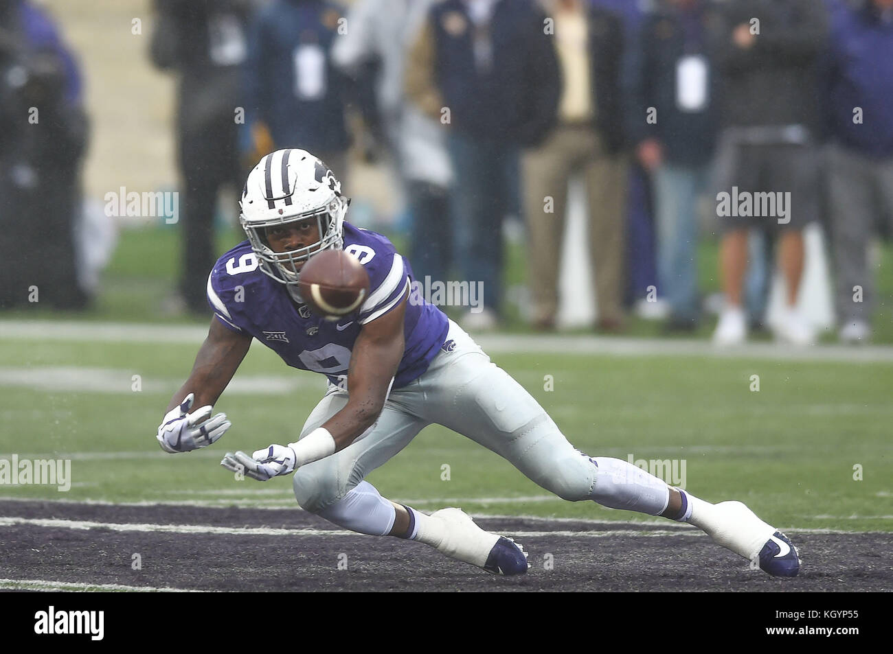 Manhattan, Kansas, USA. 11th Nov, 2017. Kansas State Wildcats wide receiver Byron Pringle (9) looks the ball into his hands during the NCAA Football Game between the West Virginia Mountaineers and the Kansas State Wildcats at Bill Snyder Family Stadium in Manhattan, Kansas. Kendall Shaw/CSM/Alamy Live News Stock Photo