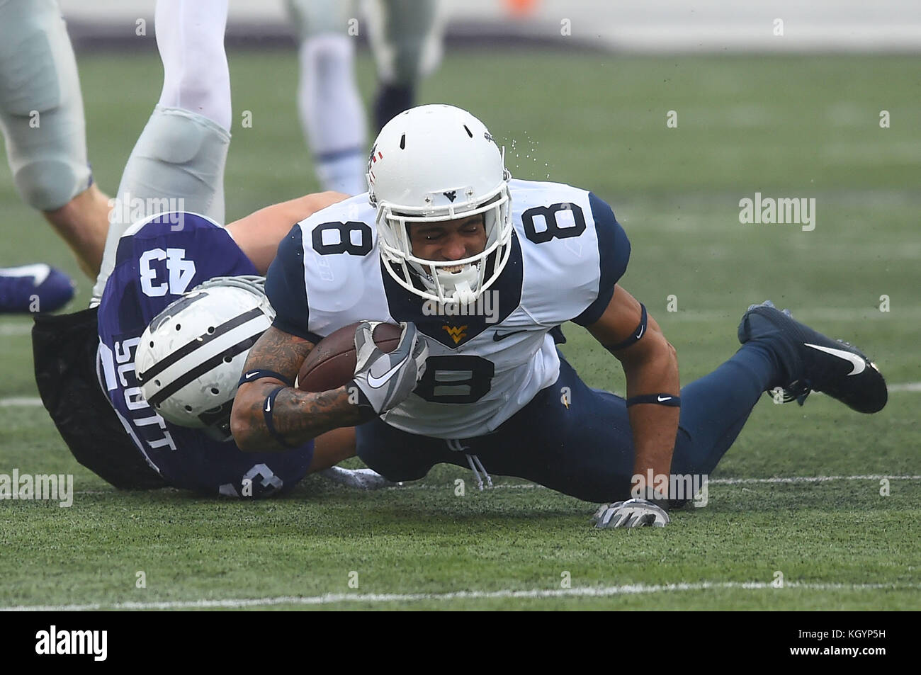 Manhattan, Kansas, USA. 11th Nov, 2017. West Virginia Mountaineers wide receiver Marcus Simms (8) is tackled after a reception in the first halfduring the NCAA Football Game between the West Virginia Mountaineers and the Kansas State Wildcats at Bill Snyder Family Stadium in Manhattan, Kansas. Kendall Shaw/CSM/Alamy Live News Stock Photo