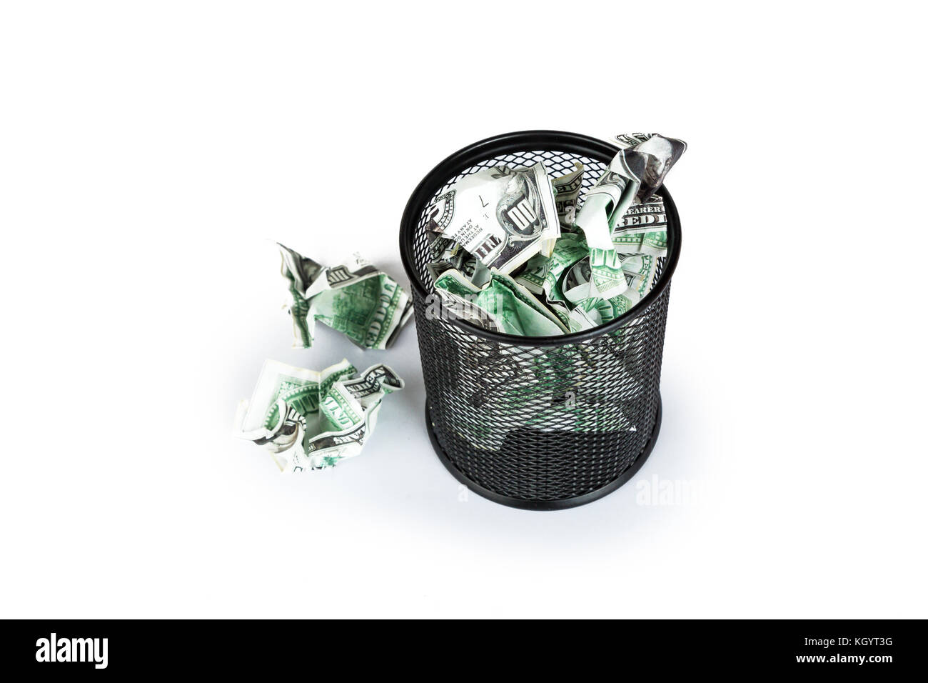 Dollar banknotes crumpled inside garbage basket, rubbish bin focused on ...