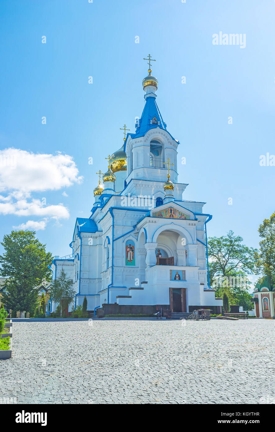 Beautiful Holy Spirit Church with golden domes located in Holy Spirit Skete next to Pochaev Lavra, Ukraine Stock Photo