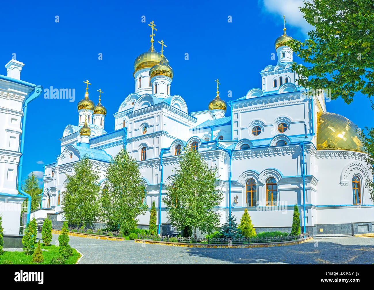 Beautiful All Saints Church of Holy Spirit Skete is the newest church, surrounded with monastery garden, Pochaev, Ukraine Stock Photo