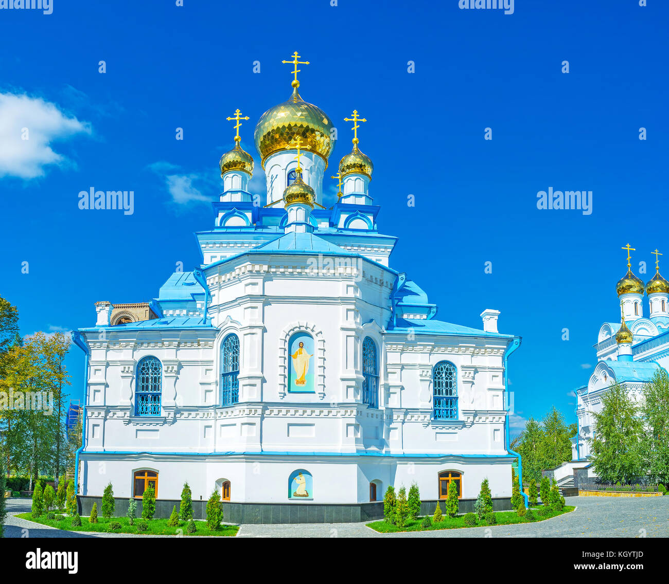 The view on rear side of Holy Spirit Church with beautiful golden domes, Pochaev, Ukraine Stock Photo