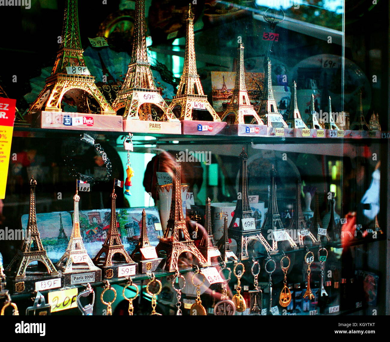 Souvenirs for sale on models of eiffel tower hi-res stock photography ...