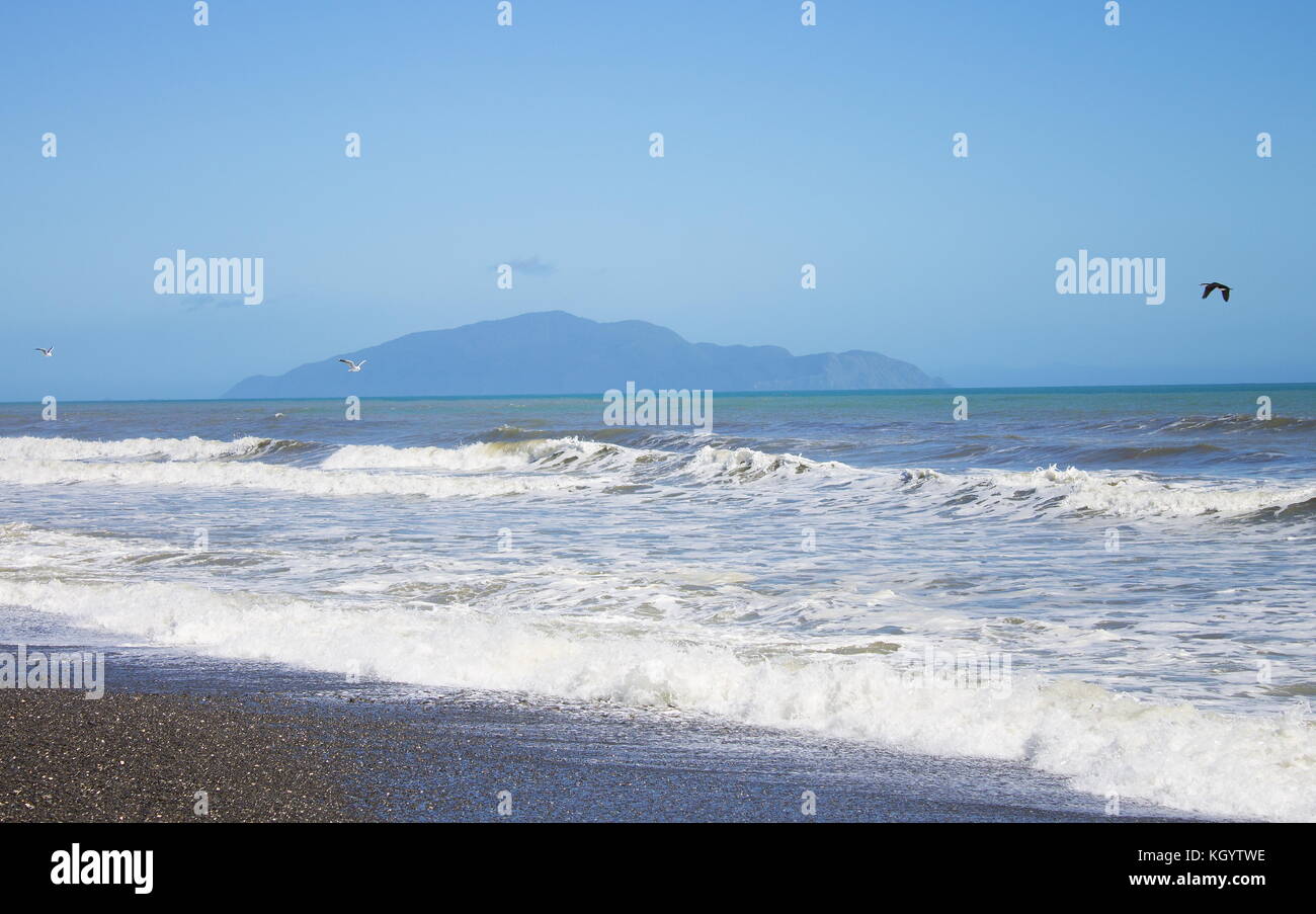 Kapiti Island viewed from Otaki Beach on the Kapiti Coast of New Zealand. Stock Photo