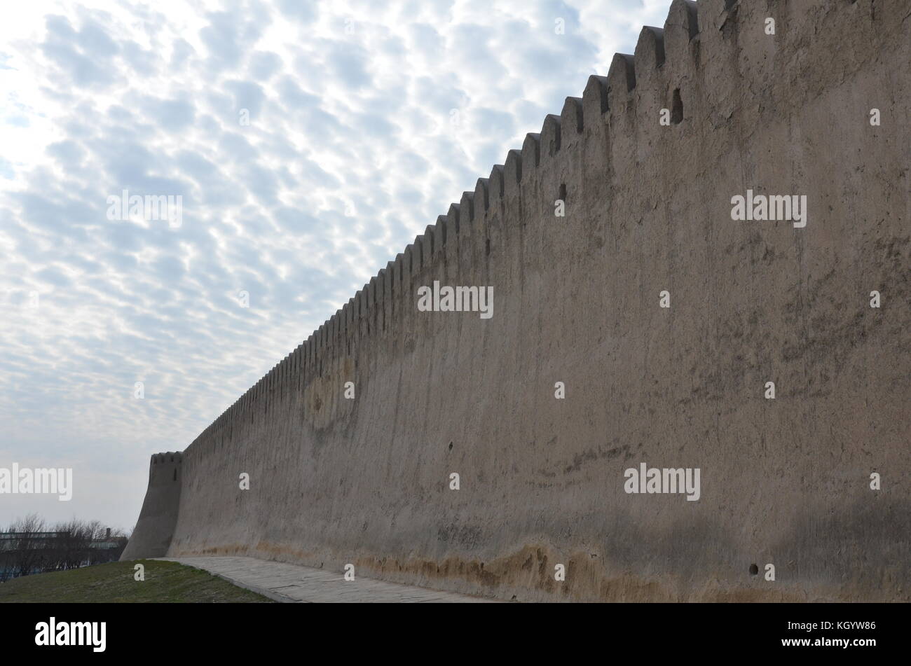 City wall, with water like clouds, of Turkestan, Turkistan, is an ancient city in Kazakhstan with archelogic record dating back to the 4th century. Stock Photo