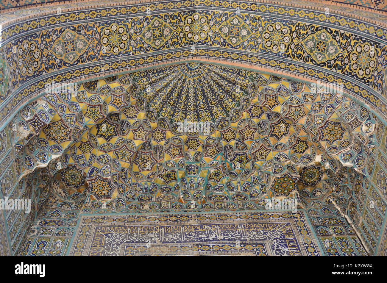 Iwan detail. Ulugh Beg, Tilya-Kori and Sher-Dor Madrasah, islamic schools,  in Samarkand silk route city, Uzbekistan, Registan square, Sand place. Stock Photo