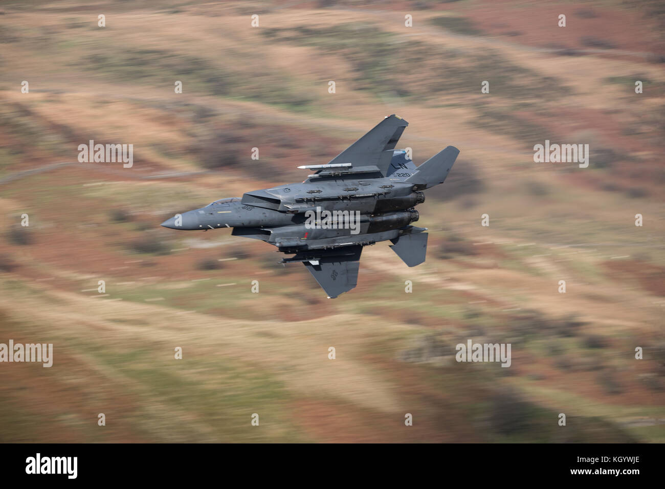 AF 97 220 F-15E Strike Eagle carrying out low flying trainin in Wales. Stock Photo