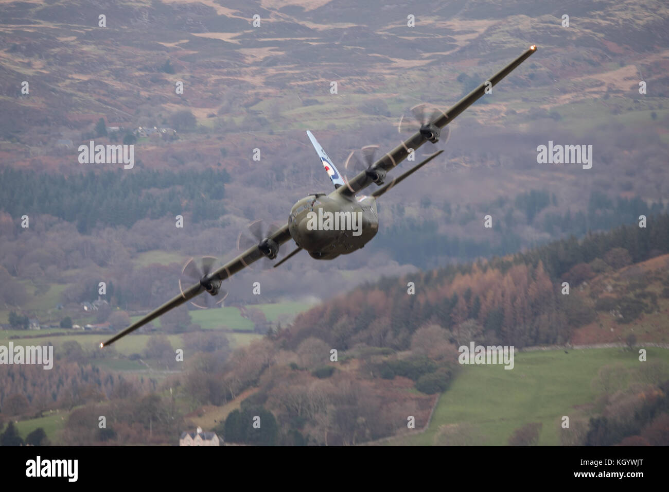 Royal Air Force two ship Hercules Flight conducting low flying training sortie in Snowdonia. Stock Photo