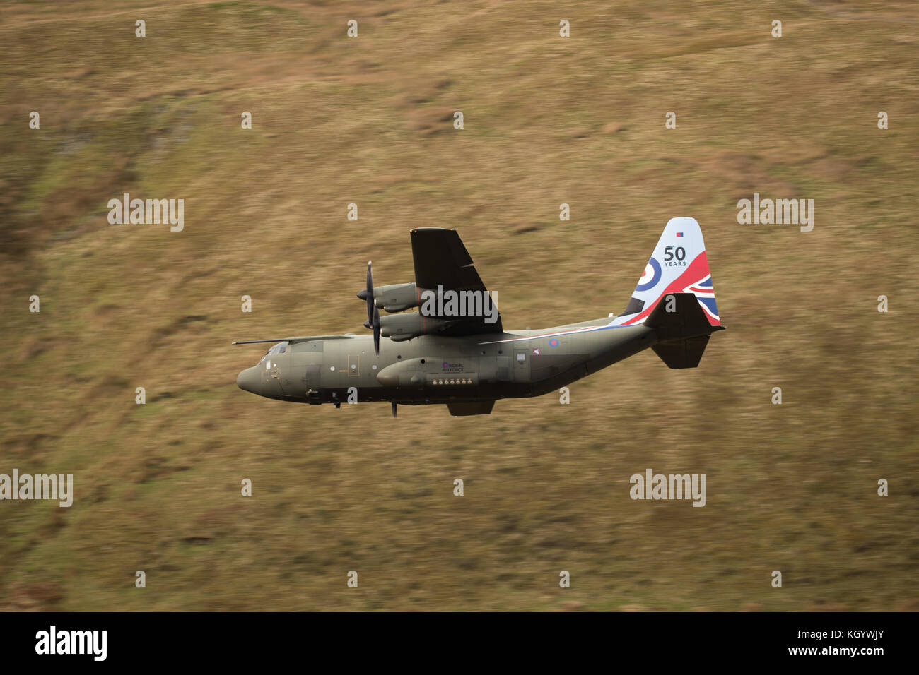 Royal Air Force two ship Hercules Flight conducting low flying training sortie in Snowdonia. Stock Photo