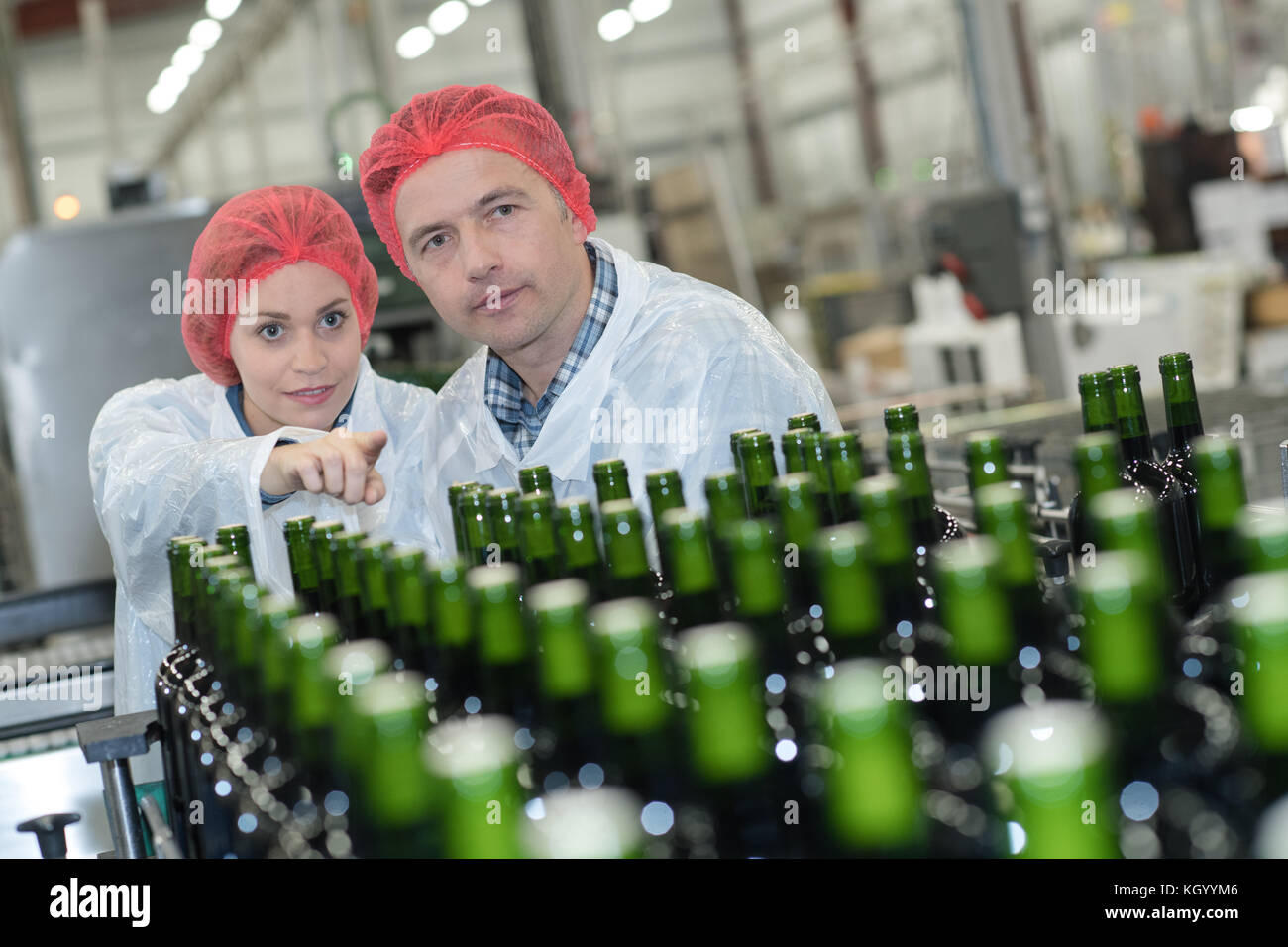 Workers in wine bottling factory Stock Photo Alamy