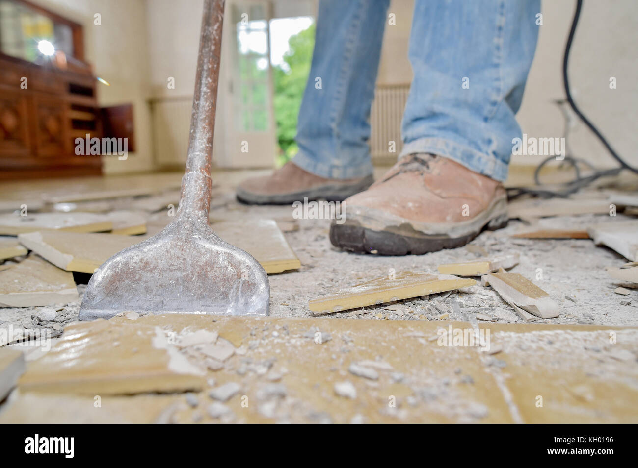 Removing old floor tiles Stock Photo Alamy