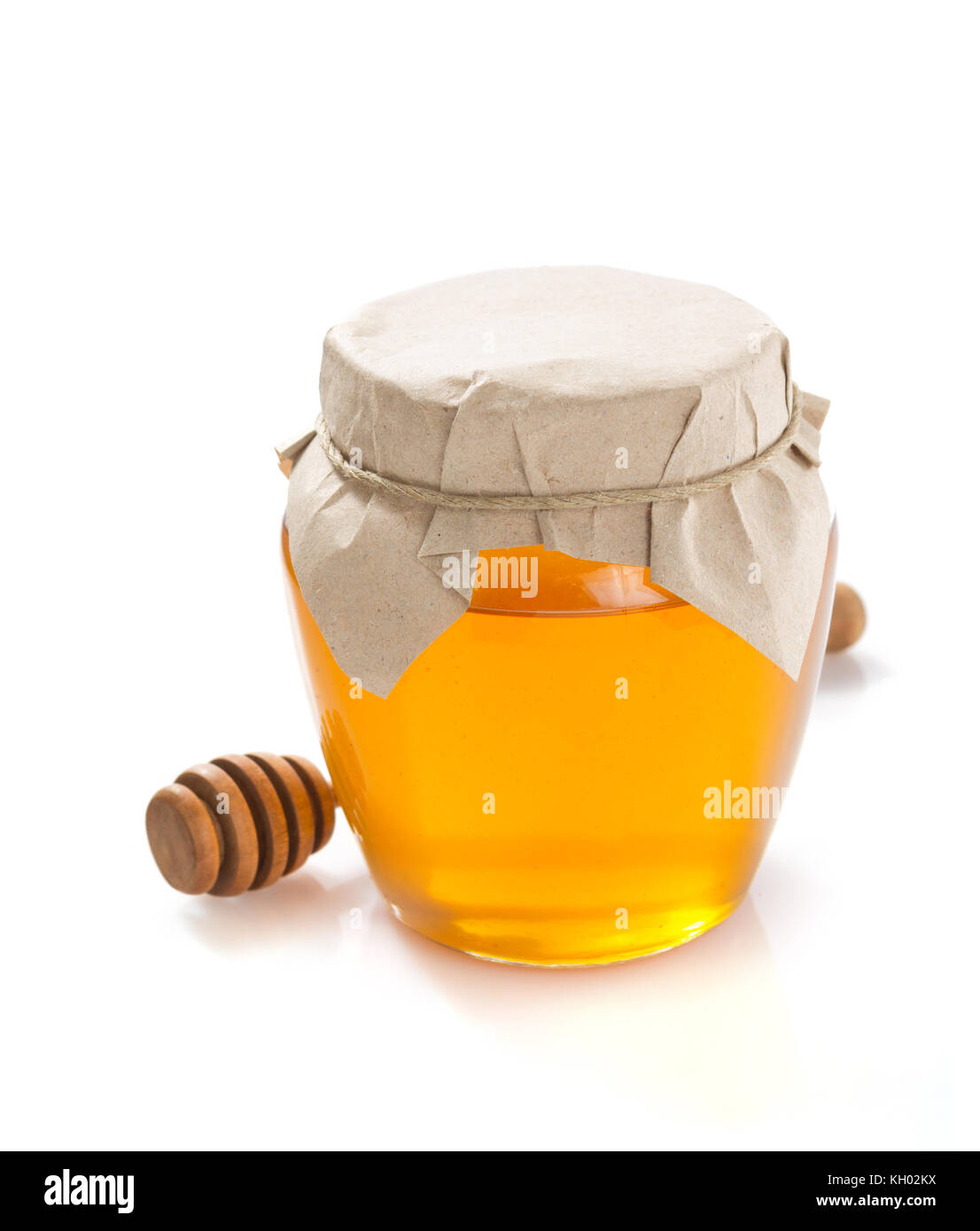 glass jar of honey isolated on white background Stock Photo - Alamy