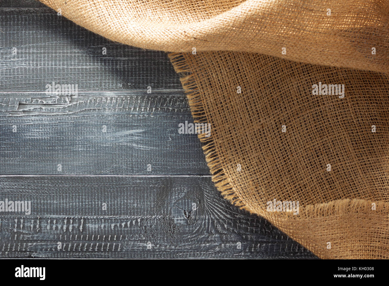 Sacking burlap hessian sacking on wooden background Stock Photo - Alamy