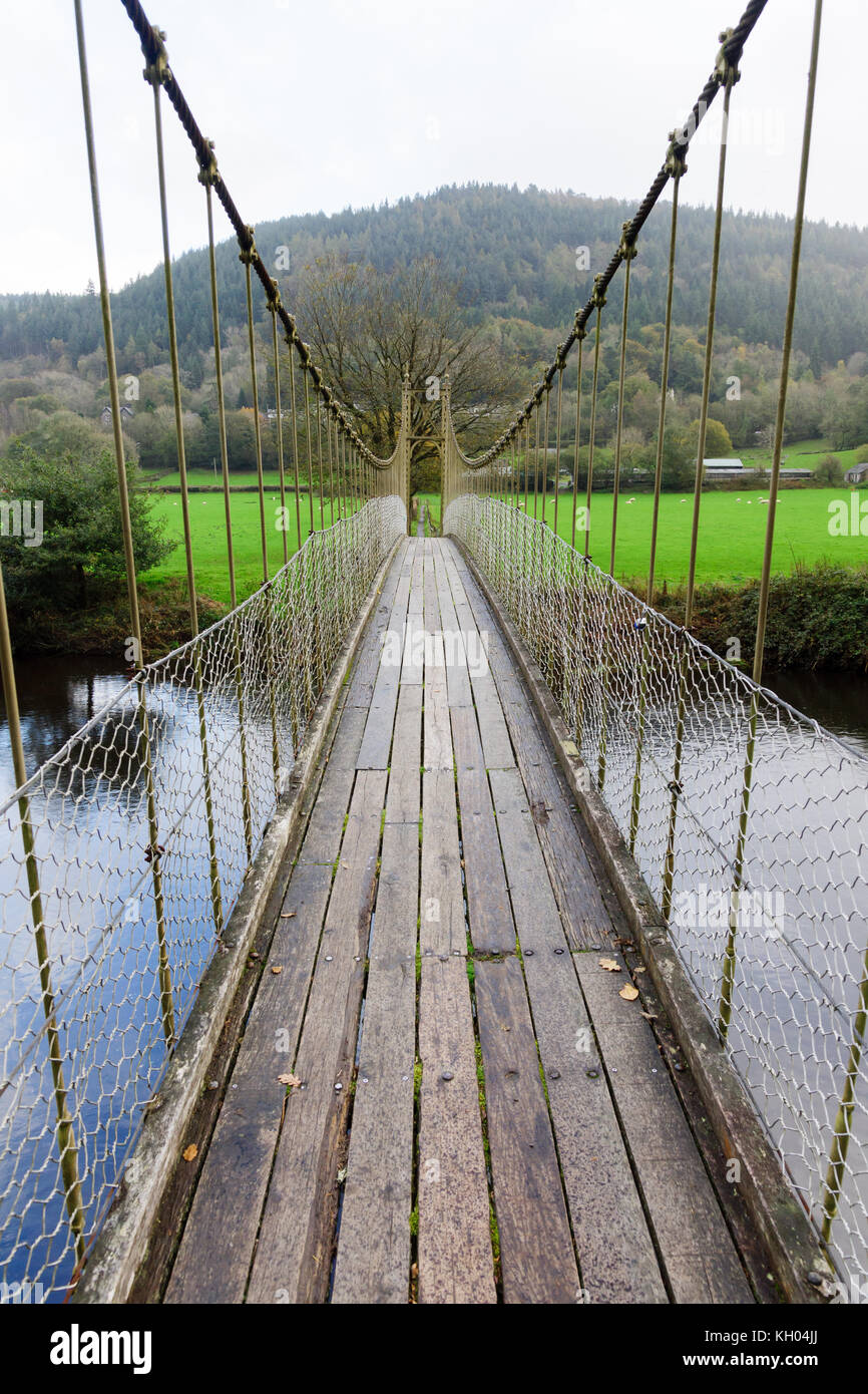 The Sappers suspension bridge over the River Conwy built in 1930 and a prominent landmark in the village of Betws-y-Coed in North Wales Stock Photo