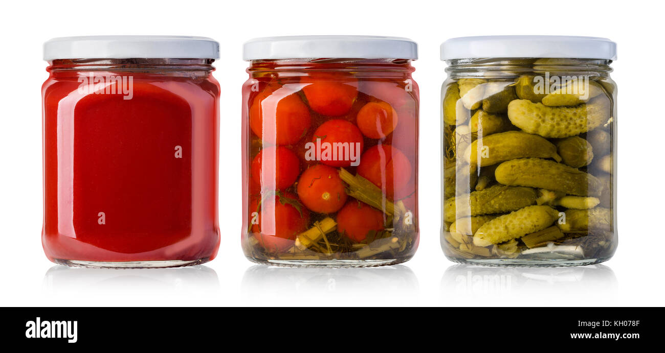 Preserved, pickled vegetables and food ingredients  in glass jars Stock Photo