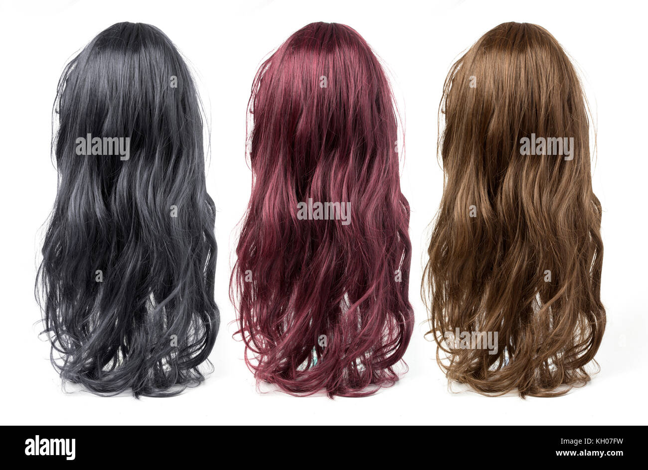 set of long curly  wigs on a white background Stock Photo