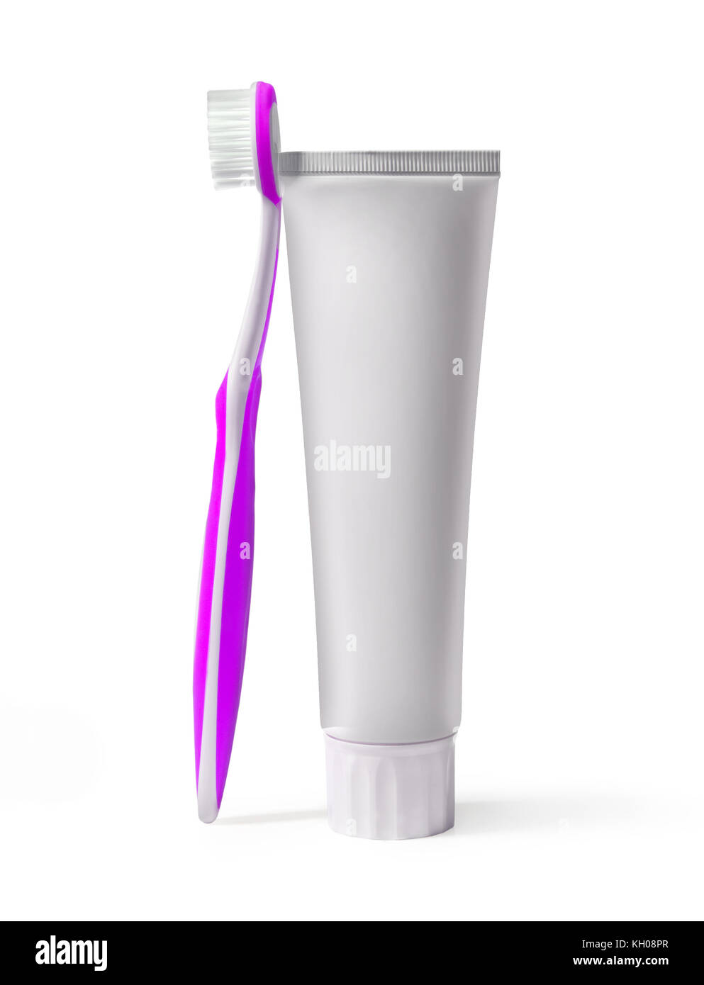 Toothbrush and tube isolated on a white background Stock Photo - Alamy