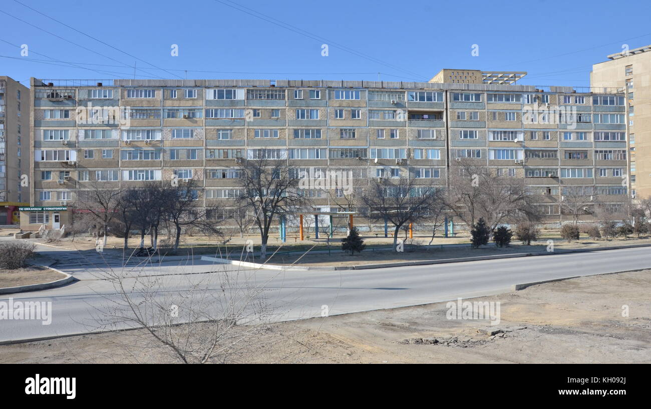 old low cost soviet union style Khrushchyovka apartment building, numbered, in Aktau, Kazakhstan. Stock Photo