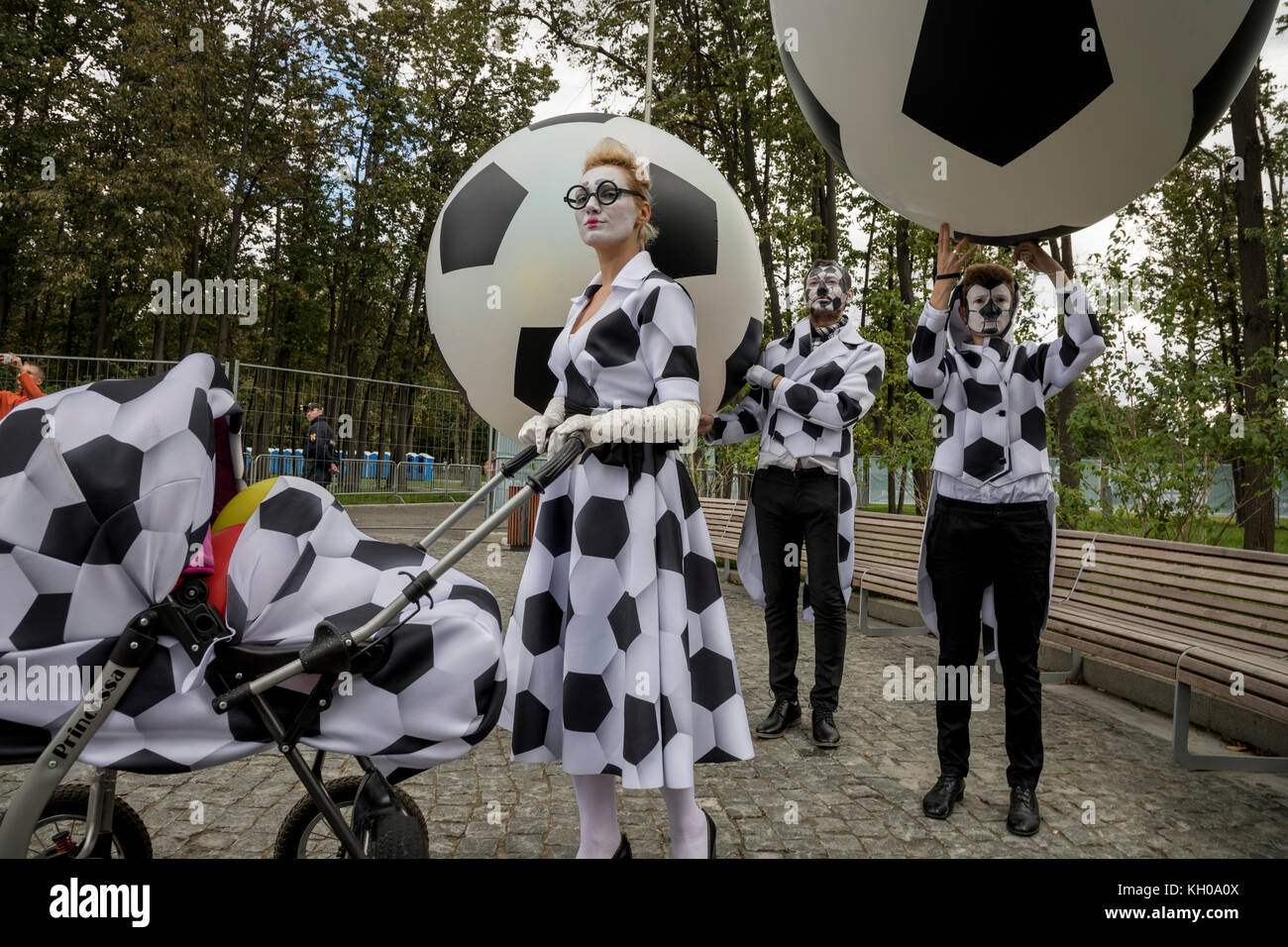 Street artists in a soccer ball suit at the festival 'Russia loves football' in Moscow near the stadium Luzhniki, Russia Stock Photo