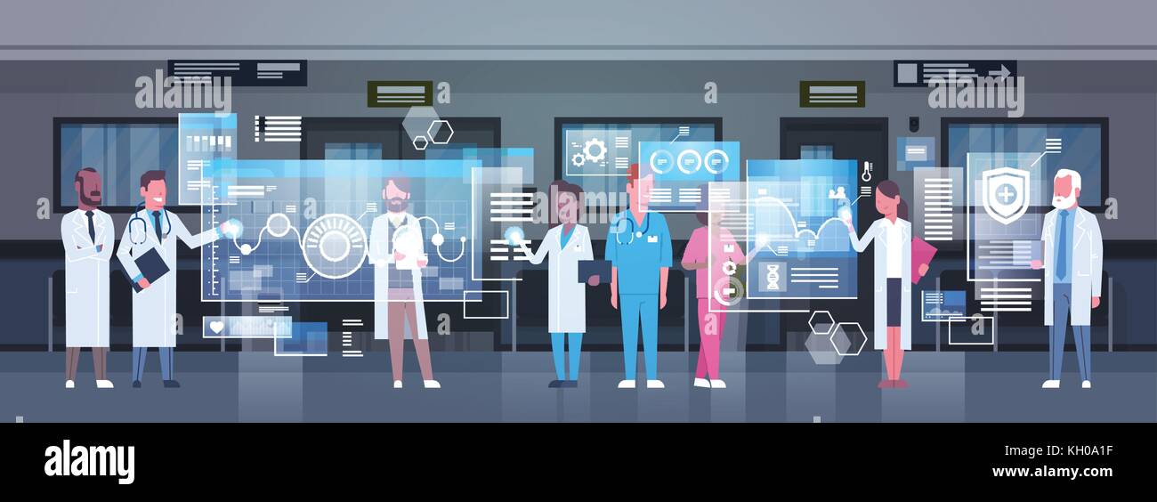 Group Of Medical Doctors Using Digital Monitor Working In Hospital Medicine And Modern